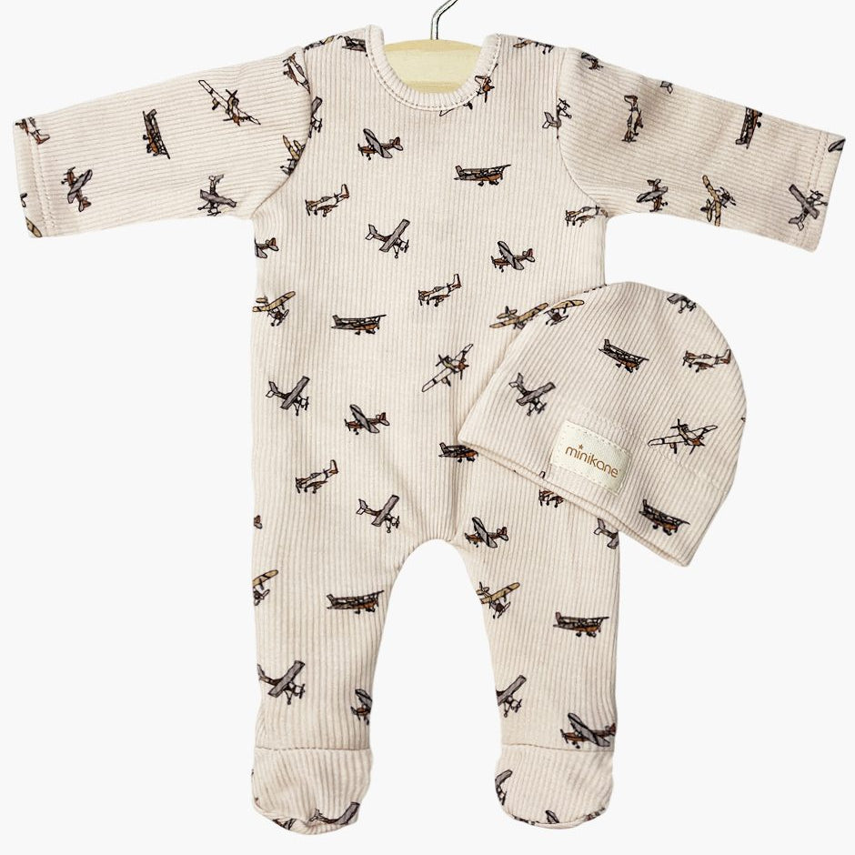 US stockist of Minikane's Angelo Sleep well set in Beige Airplanes print with matching hat.  For Bambini dolls