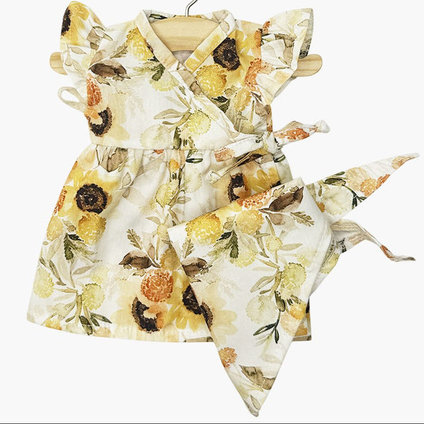 US stockist of Minikane's Elise Dress set in Sunflower