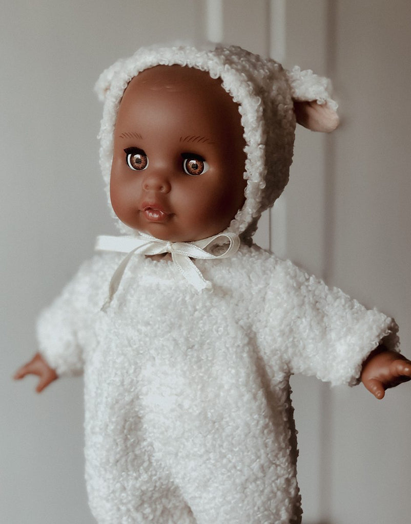 US stockist of Minikane's 10.2" Celeste Dreamy baby doll dressed in her ecru lamb outfit