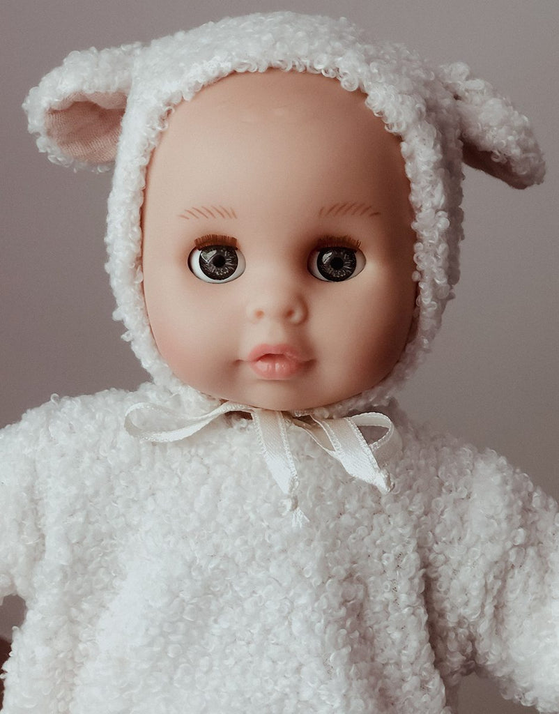 US stockist of Minikane's 10.2" Celestine Dreamy baby doll dressed in her white lamb outfit