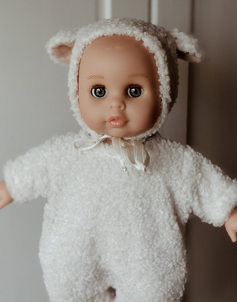 US stockist of Minikane's 10.2" Celestine Dreamy baby doll dressed in her white lamb outfit