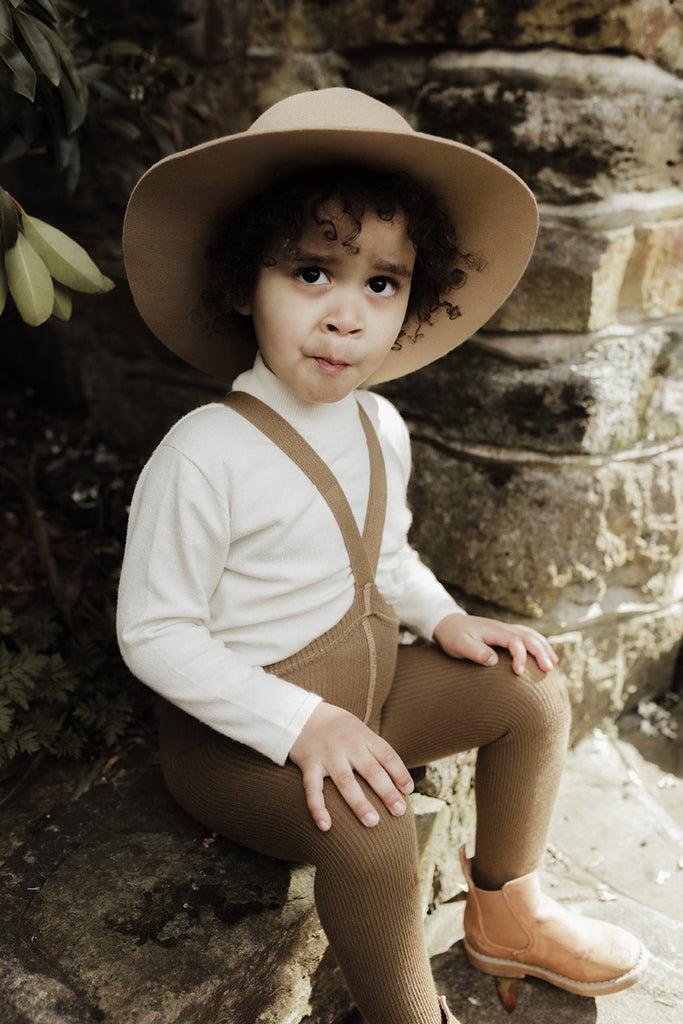 US stockist of Silly Silas' gender neutral, organic cotton footed tights in Acorn Brown.