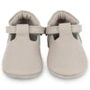 US stockist of Donsje USA's Elia premium handmade leather t-bar shoes.  Light stone in color with velcro fastening.  Sizes 0-12 mths have soft sole, 12-30mths have a soft flexible, rubber sole.