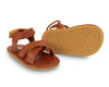 US stockist of Donsje USA's Giggles premium handmade leather sandals.  Cream in color with velcro fastening at back.  Sizes 0-12 mths have soft sole, 12-30mths have a soft flexible, rubber sole.