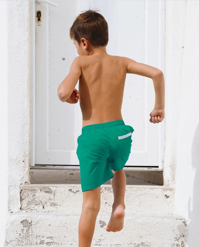 US stockist of Canopea's quick dry Diego swim short in Baleares Green.