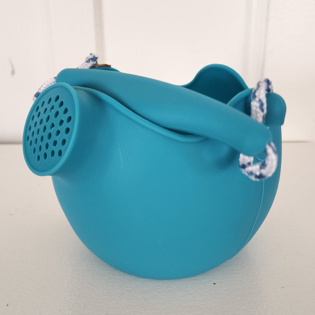 US stockist of Scunch's silicone watering can in Petrol blue