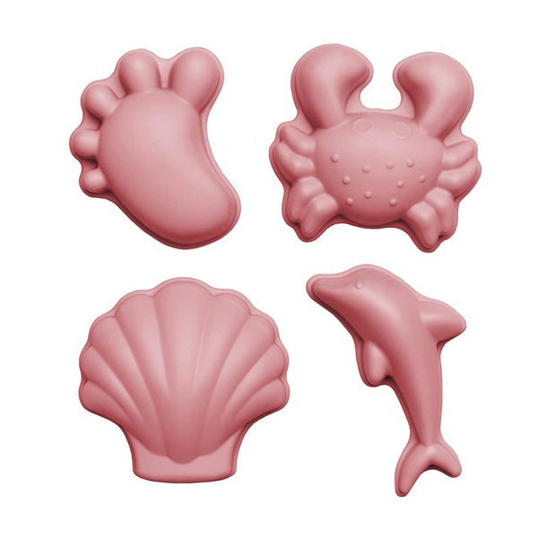 US stockist of Scunch.  Set of 4 sand moulds in dusty rose made from silicone.  Comes with 1 footprint, 1 crab, 1 shell and 1 dolphin mould.