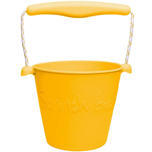 US stockist of Scrunch's mustard bucket.  Made from non-toxic, food grade silicone with a rope handle.