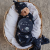 US stockist of Snuggle Hunny Kid's jersey wrap and beanie set in Milky Way.