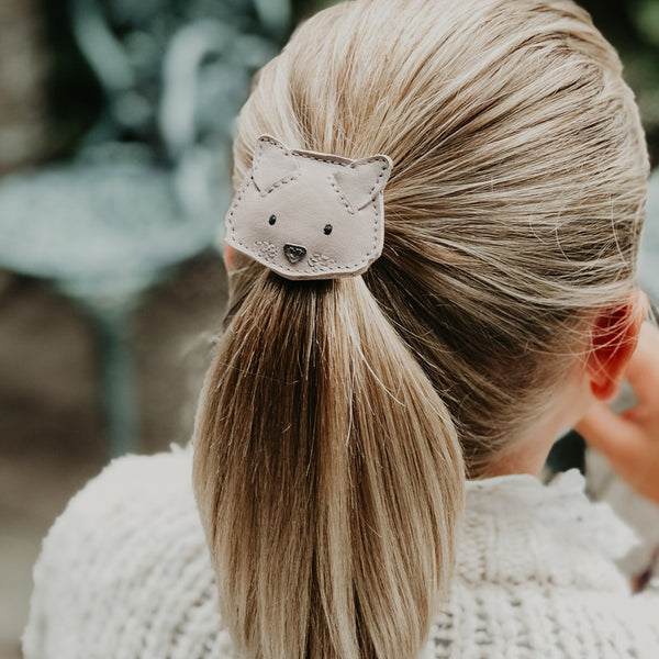 US stockist of Donsje's Josy Cat hair clip. Handmade from premium pink leather with a snap hair clip.