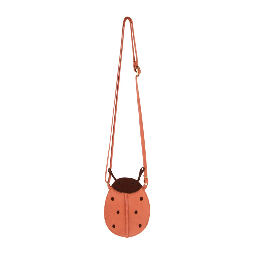 US stockist of Donsje's Lady Bug Toto Purse.  Handmade from red leather with a zip on the back and an adjustable strap.
