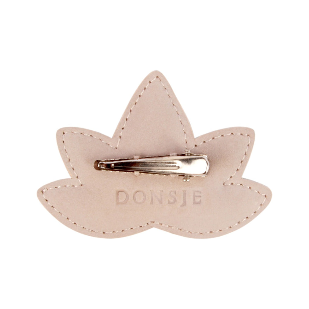 US stockist of Donsje's Zaza Fields Lotus hair clip. Handmade from premium pink leather with a snap hair clip.