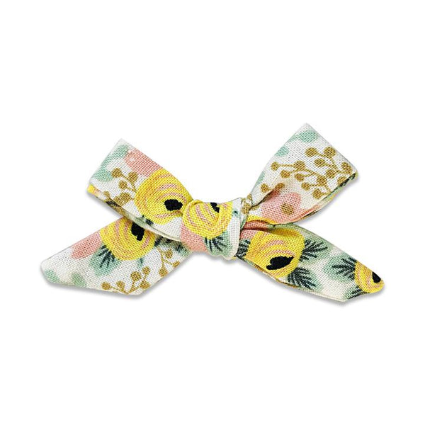 US stockist of Josie Joan's Aisha petite bow hair clip.  Cream colored fabric with pink and yellow flowers with contrasting green foilage with mustard berries.