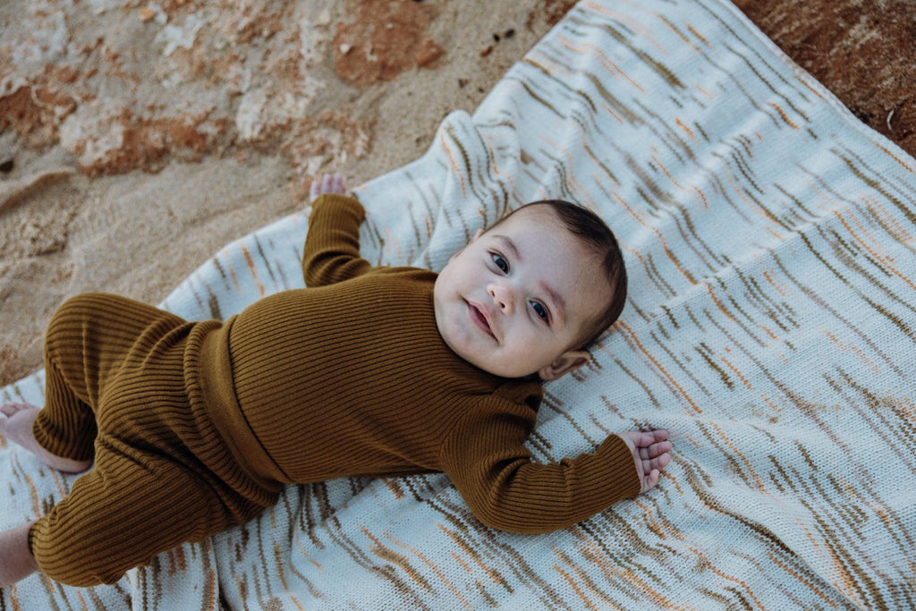 US stockist of Grown Clothing's gender neutral, organic cotton, ribbed essential leggings in Moss.