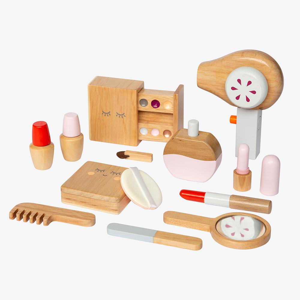 US stockist of Make Me Iconic's 11 piece wooden beauty kit.  Contains pretend play lipsticks, hair dryer, nail polishes and more.