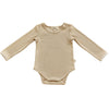 US stockist of India + Grace The Label's gender neutral, beige long sleeved ribbed cotton bodysuit.  Features crotch snap.
