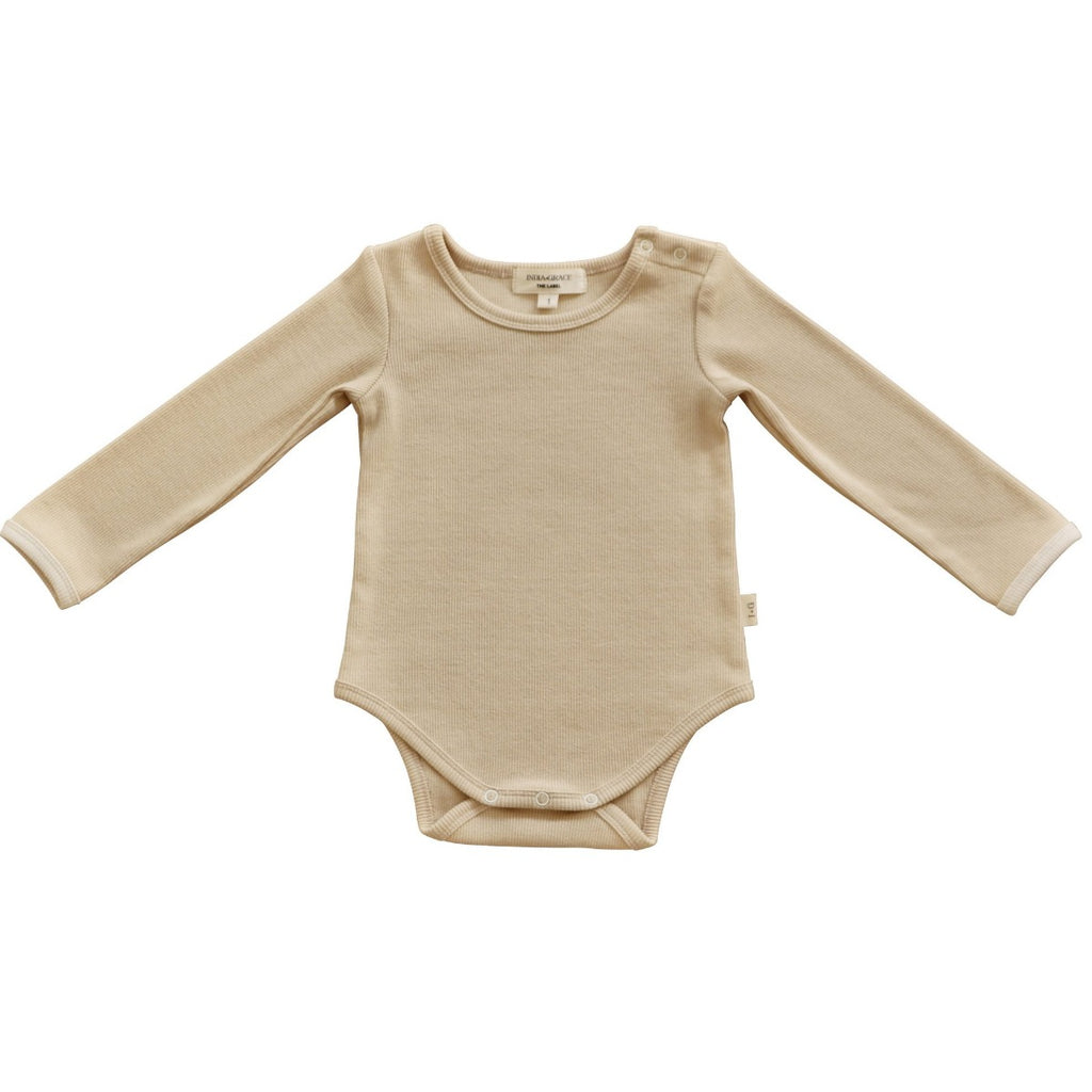 US stockist of India + Grace The Label's gender neutral, beige long sleeved ribbed cotton bodysuit.  Features crotch snap.