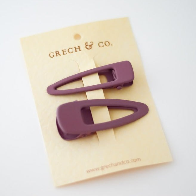 US stockist of Grech & Co's 2 piece grip hair clips.  In a matte burlwood color - one mini + one regular size.