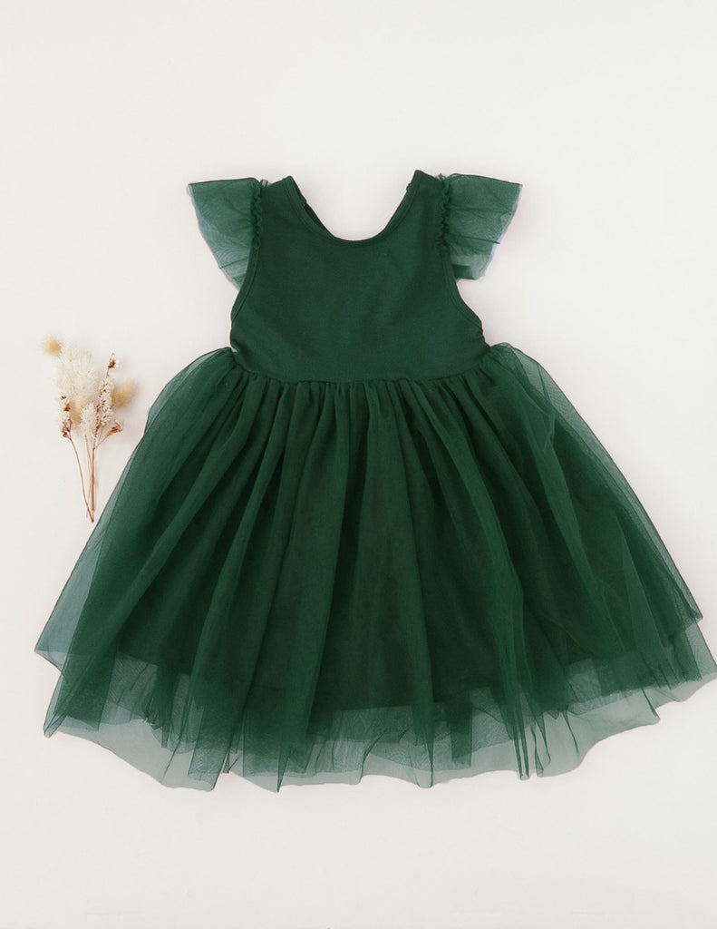 US stockist of Karibou Kid's Scarlett Tutu Dress in Emerald Green.  Made from a soft cotton blend with midi length tulle skirt.  Features open back with a big bow.