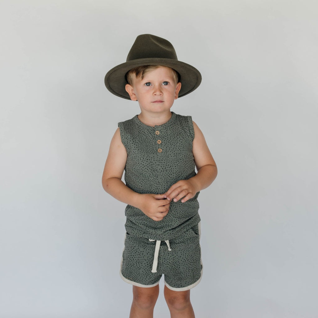 US stockist of Buck & Baa's organic cotton, gender neutral blue/green dapple shorts.  Features elastic waist with drawstring and side pockets. 
