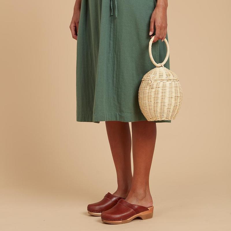 US stockist of Olli Ella's handmade rattan egg basket.  Opens at top and features a handle on top.