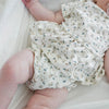 US stockist of Buck & Baa's organic cotton floral peplum top. Cream fabric with all over blue floral print.