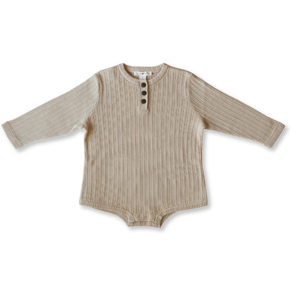 US stockist of Grown Clothing's gender neutral, organic cotton ribbed button bodysuit in Natural.