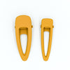 US stockist of Grech & Co's 2 piece grip hair clips.  In a matte golden color - one mini + one regular size.