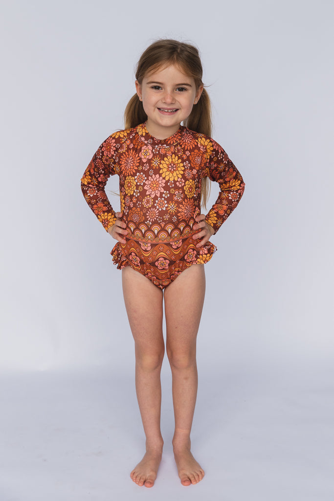 US stockist of Salty Swimwear's long sleeve rashsuit in In Bloom Tuscan.  Made from UPF 50+ Repreve fabric.