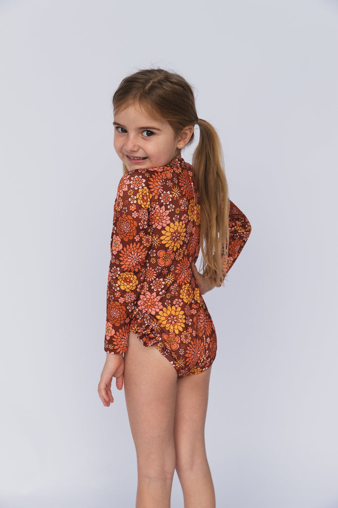 US stockist of Salty Swimwear's long sleeve rashsuit in In Bloom Tuscan.  Made from UPF 50+ Repreve fabric.