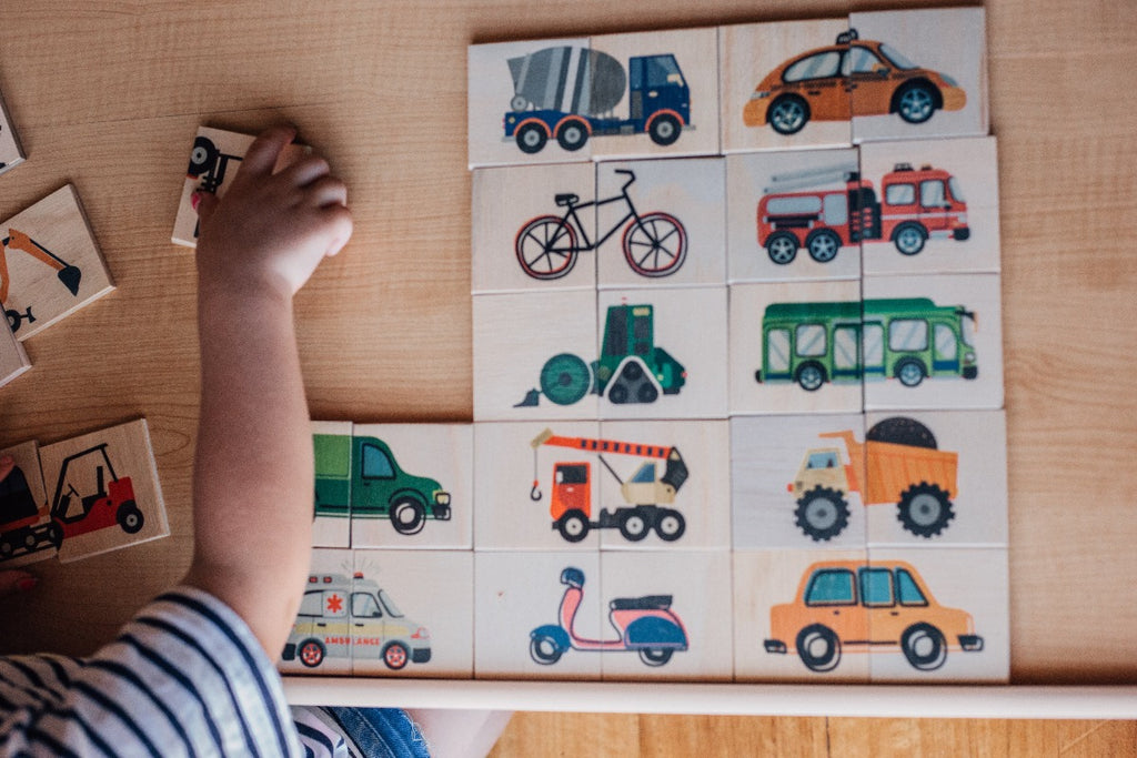 US stockist of Five Little Bears Workers and Wheels 30 piece matching puzzle.  Double sided puzzle featuring  15 modes of transport on one side and 15 people and the jobs they do on the other side.