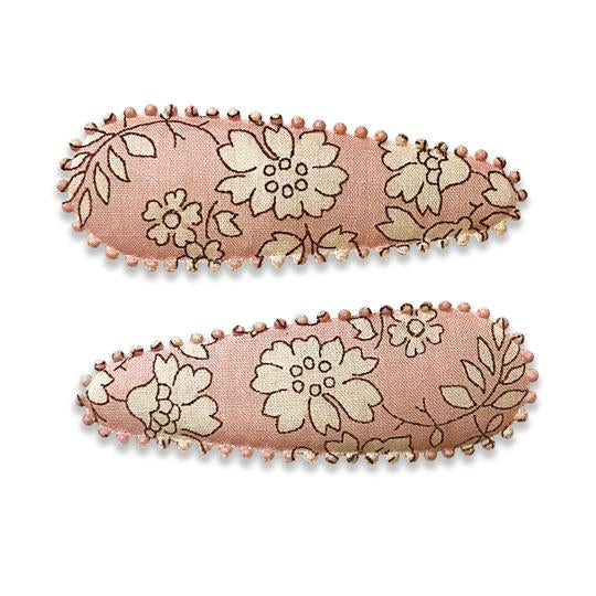US Stockist of Josie Joan's pink Josie set of two slide hair clips.  Has contrasting cream flower print and delicate edging.