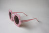 US stockist of Elle Porte's Daisy sunglasses in Fairy Floss Pink with dark lenses.