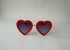 US stockist of Elle Porte's Heart shaped sunglasses in red.