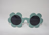 US stockist of Elle Porte's Daisy sunglasses in Spearmint Twist green with dark lenses.