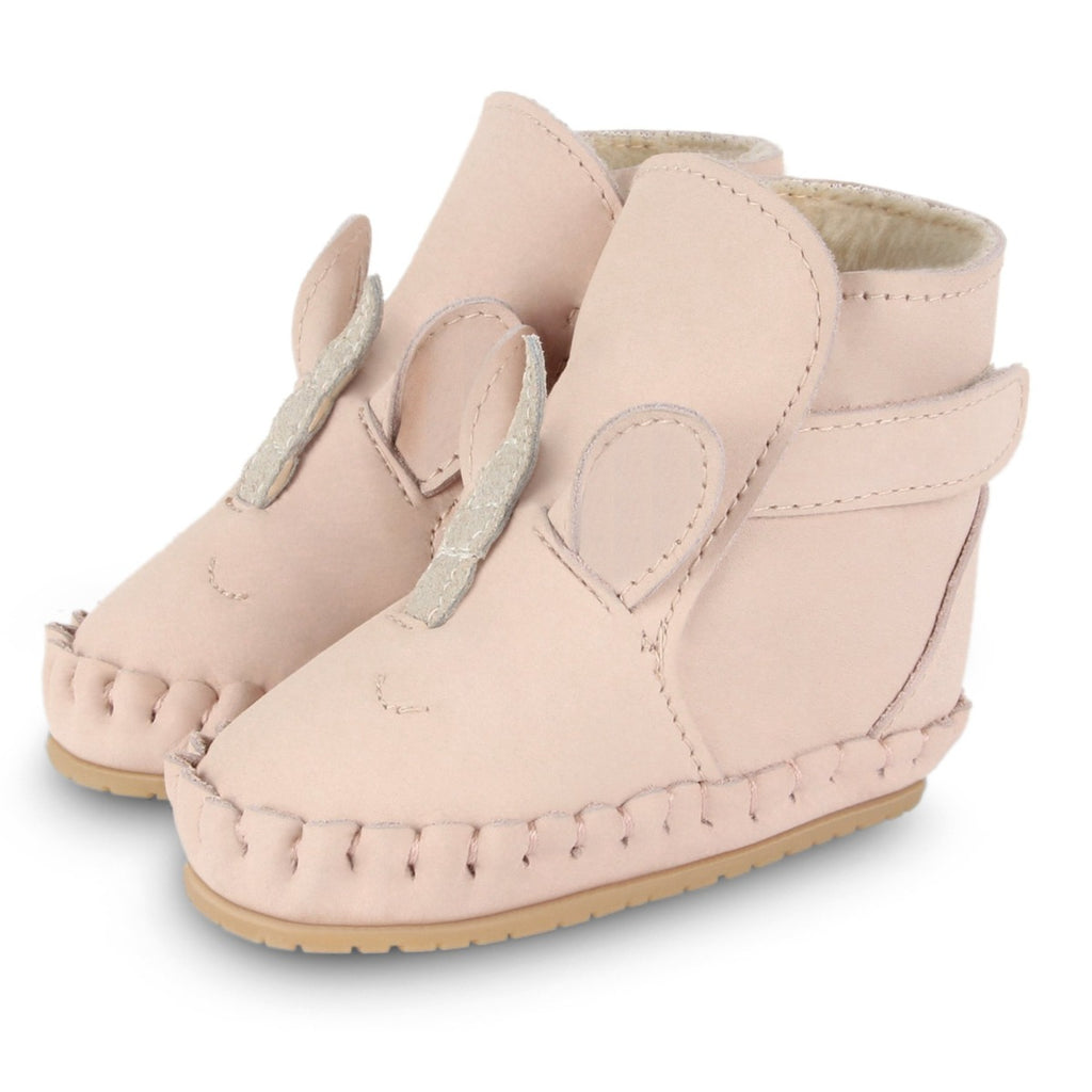 US stockist of Donsje's pale pink leather unicorn baby shoes with Kapi exclusive faux fur lining.  Velcro fastening - soft sole under 12mths.