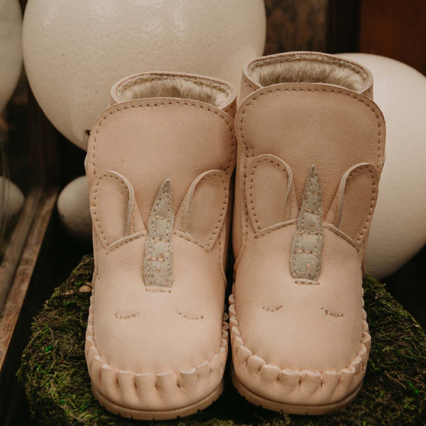 US stockist of Donsje's pale pink leather unicorn baby shoes with Kapi exclusive faux fur lining.  Velcro fastening - soft sole under 12mths.