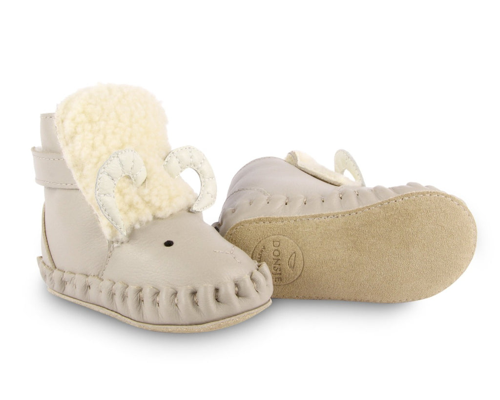 US stockist of Donsje's light grey, leather ram baby shoes with Kapi exclusive faux fur lining.  Velcro fastening - soft sole under 12mths.