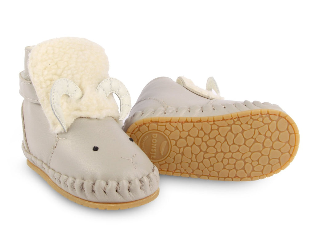 US stockist of Donsje's light grey, leather ram baby shoes with Kapi exclusive faux fur lining.  Velcro fastening - soft sole under 12mths.