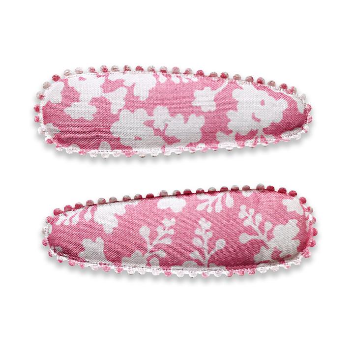 US stockist of Josie Joan's Little Mazi set of two fabric covered baby hair clips.  Gorgeous pink fabric with contrasting pale flowers and leaves.  Scalloped edging.