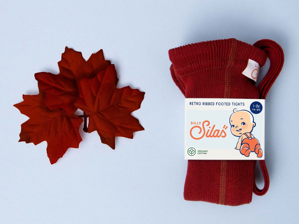 US stockist of Silly Silas' gender neutral, organic cotton footed tights in Maple Leaf.