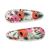 US stockist of Josie Joan's Marni set of two fabric hair clips.  Cream colored fabric with pink and orange flowers and green foilage.  Features scalloped edging.