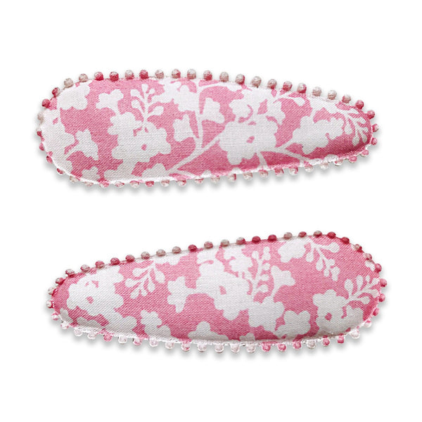 US stockist of Josie Joan's Mazi set of two fabric covered hair clips.  Gorgeous pink fabric with contrasting pale flowers and leaves.  Scalloped edging.