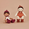 US stockist of Olli Ella's Dinkum Doll Knit Berry Set.  Features cotton knit bonnet and hard sole knit booties with pom poms on front. 