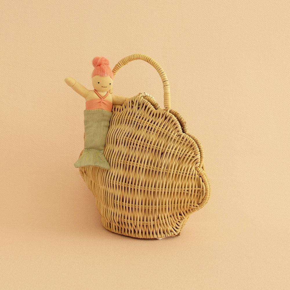 US stockist of Olli Ella's handwoven shell bag in straw. Made from rattan.