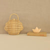 US stockist of Olli Ella's handwoven shell bag in straw. Made from rattan.