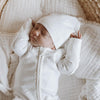 US stockist of Buck & Baa's gender neutral, organic cotton ribbed knotted hat in Milk.