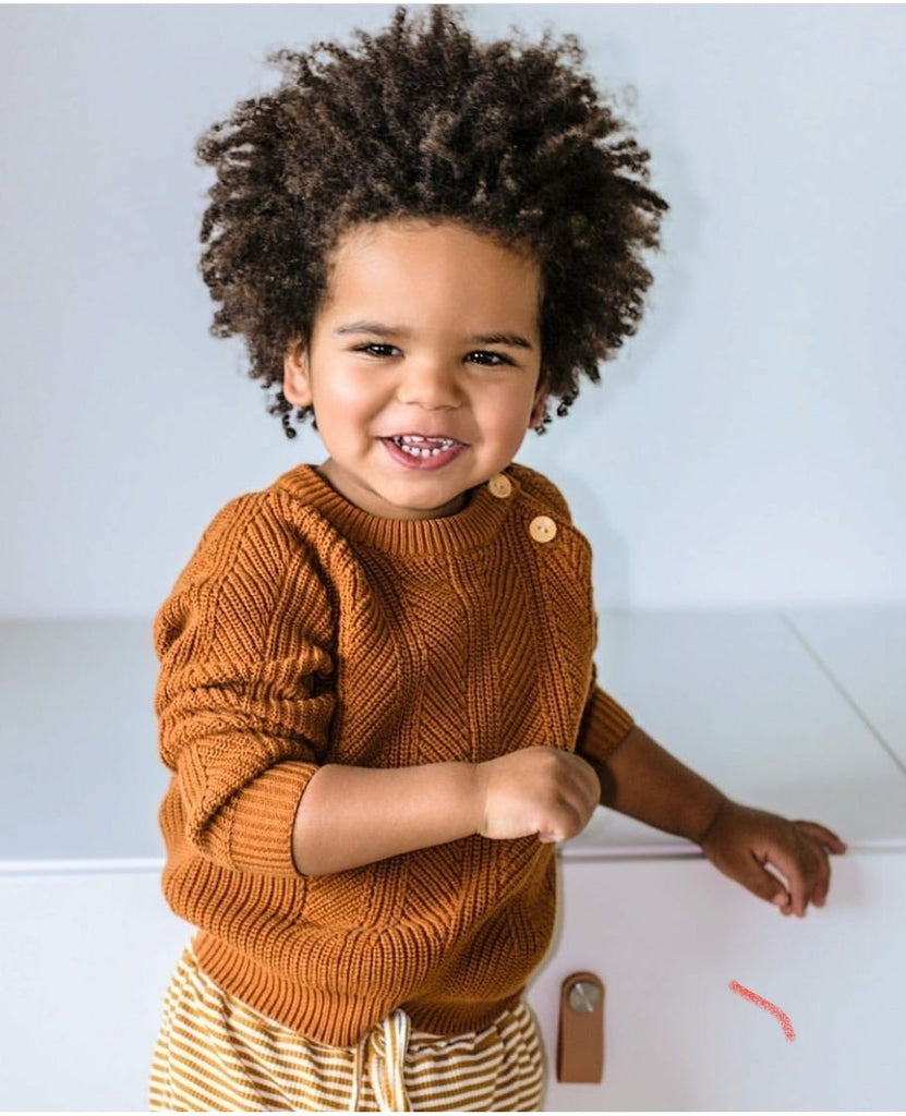US stockist of Two Darlings gender neutral rust knit sweater.  Made from 100% cotton with two wood like buttons on the left shoulder.  Soft and stretchy.