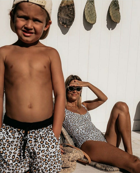 US stockist of Salty Swimwear's Kalani board shorts in Leopard Wild Ones.  Made from UPF 50+ recycled Repreve fabric.  Features tie waist and pockets for treasures.