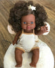 US stockist of Minikane's "Charlie" girl doll.  Measures 13" in height and has moveable limbs.  Anatomically correct and features curly brown hair, brown skin and blue eyes.